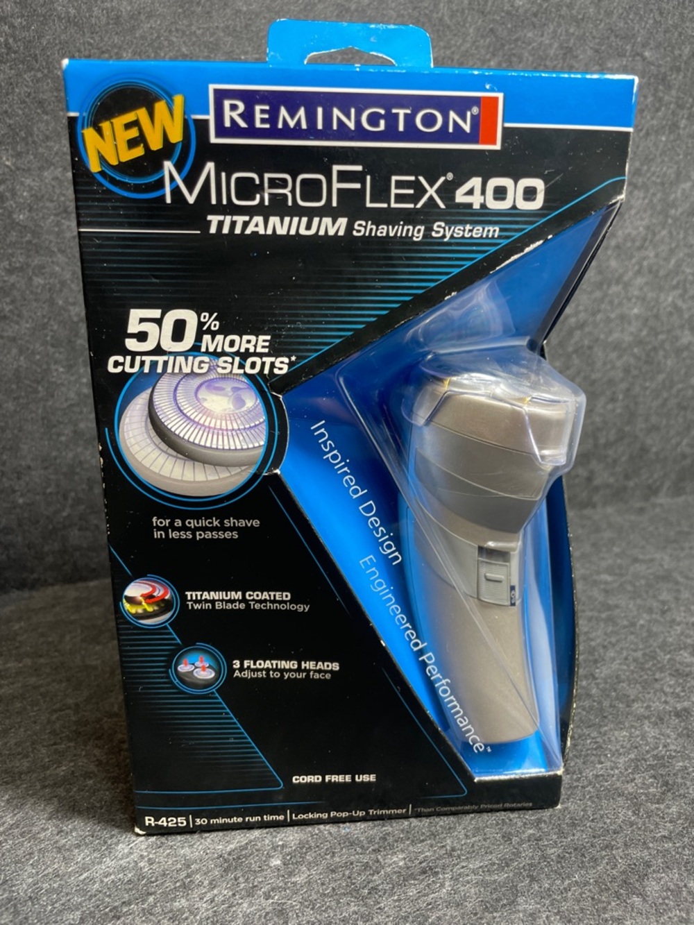 Remington Silver Electric Shaver with Blue Accents